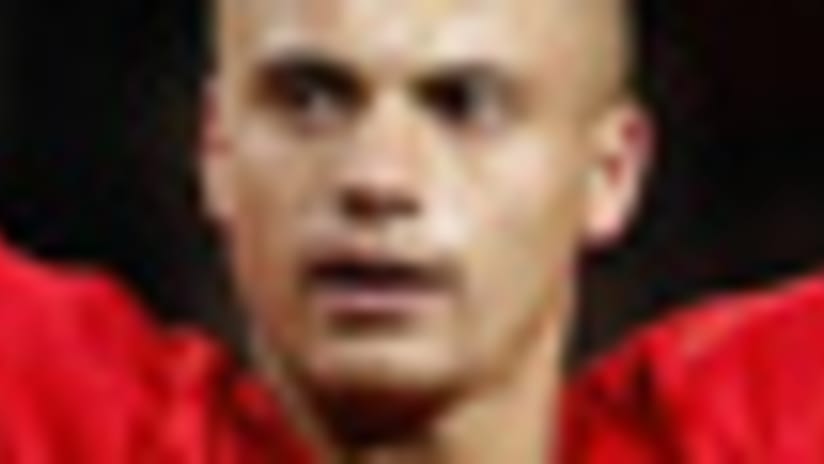 United's Wes Brown scored a rare goal to help his club claim a 3-0 victory and three valuable points vs. Liverpool.
