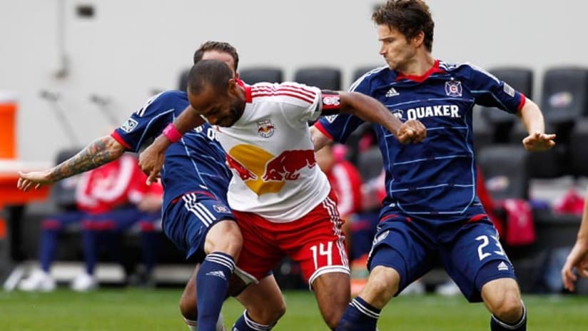 Arne Friedrich and Thierry Henry do battle