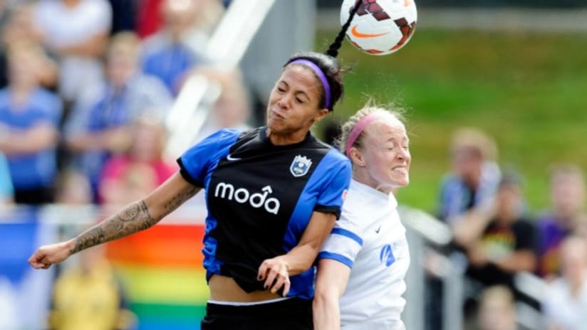 Sydney LeRoux and Becky Sauerbrunn in the 2014 NWSL final