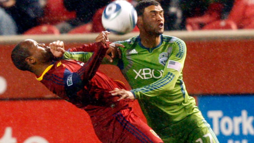 RSL's Andy Williams gets an arm to the face from Seattle's Lamar Neagle.
