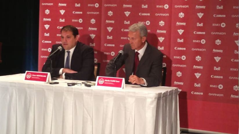 Benito Floro (right) is introduced as new Canada manager.