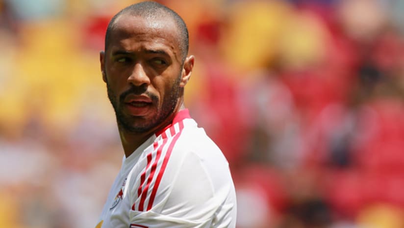 Thierry Henry looks in the general direction of someone he does not like.