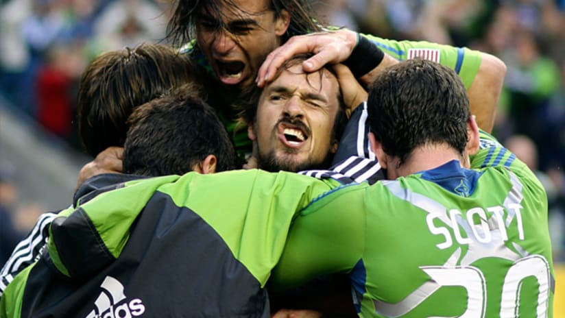 Seattle's Roger Levesque celebrates his second goal vs. New York by making a pirate face.