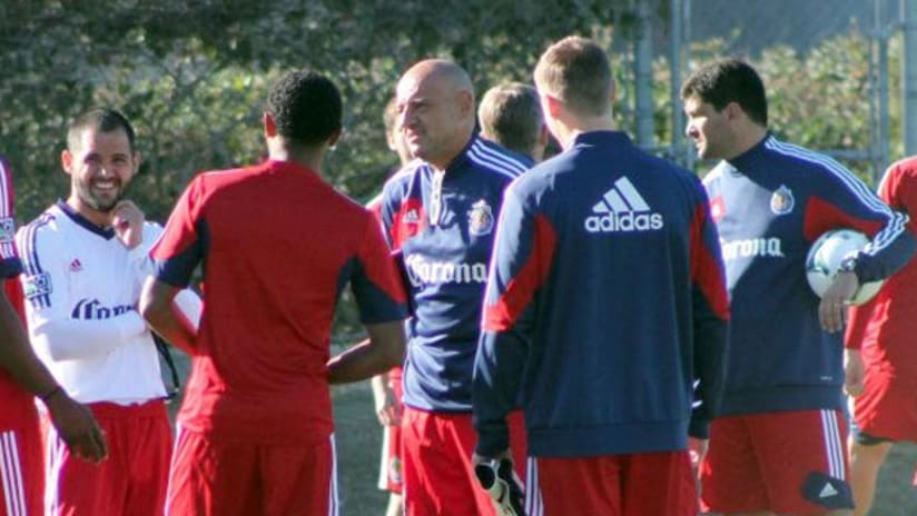 Chelis huddles with his Chivas USA players