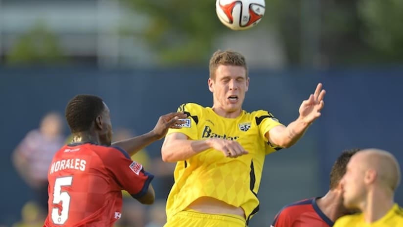 Columbus Crew's Adam Bedell and Indy Eleven's Erick Norales
