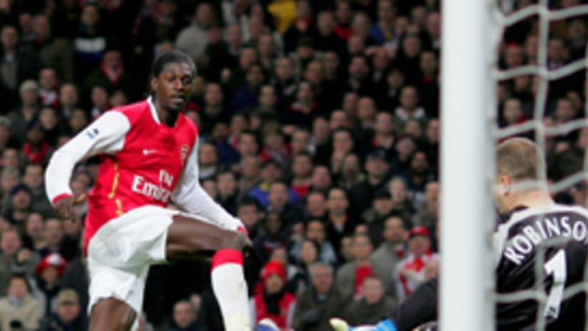 Emmanuel Adebayor scored twice to lead the Gunners to a come-from-behind victory.