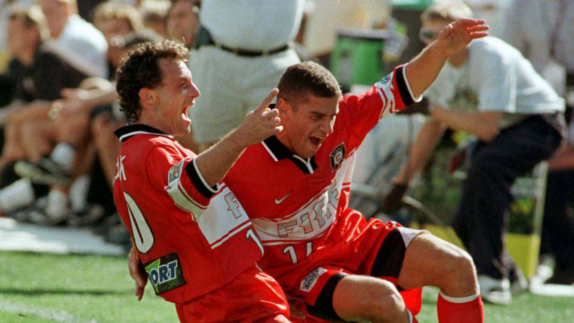 Peter Nowak and Chris Armas celebrate Chicago's 1998 MLS Cup win