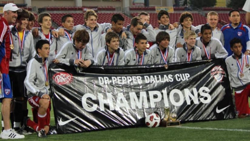 The FC Dallas Under-15 team celebrates winning the title at the Dallas Cup on Sunday.