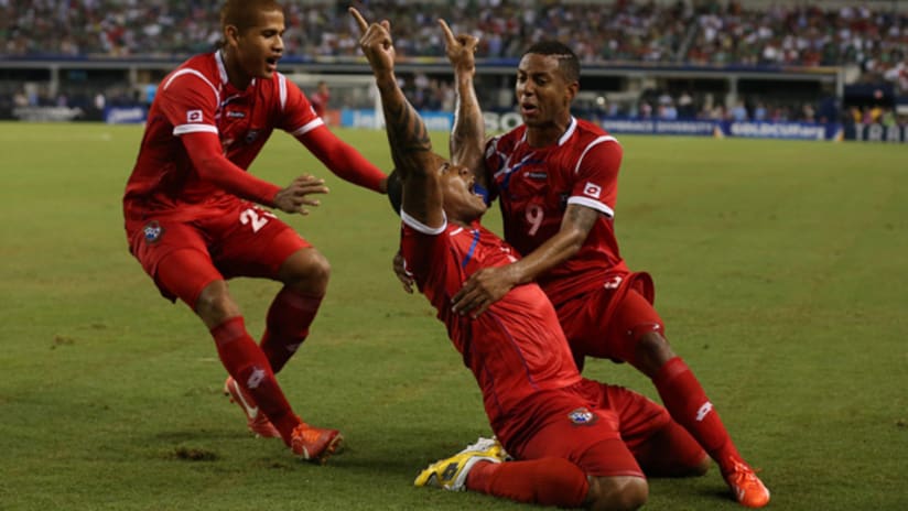 Blas Perez slides in celebration for Panama after a goal