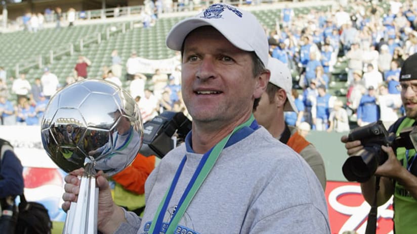 Frank Yallop hoists the MLS Cup trophy in 2003