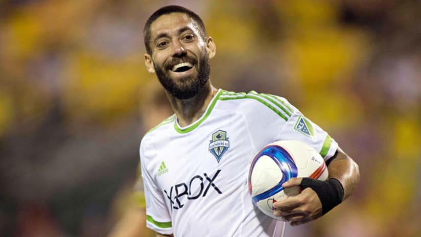 Seattle Sounders forward Clint Dempsey smiles after scoring