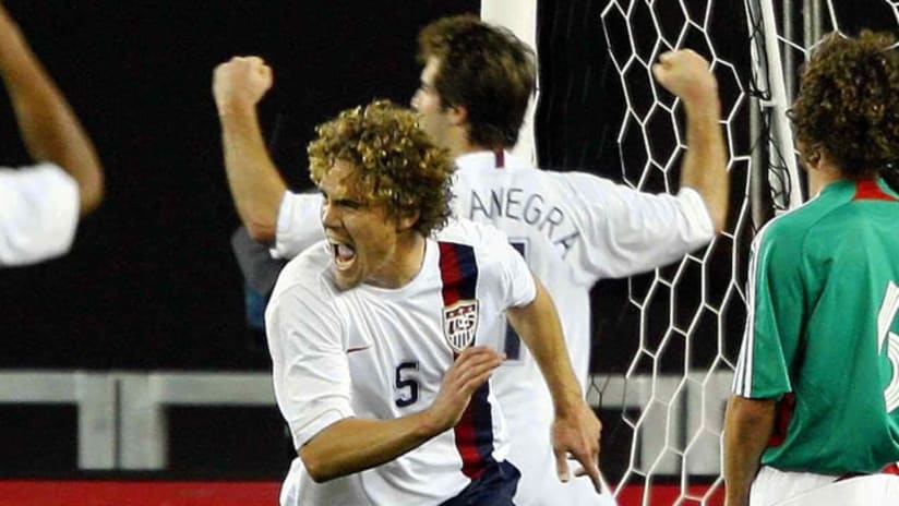 Chris Albright and Carlos Bocanegra celebrate a goal for the USMNT during a friendly vs. Mexico in 2007