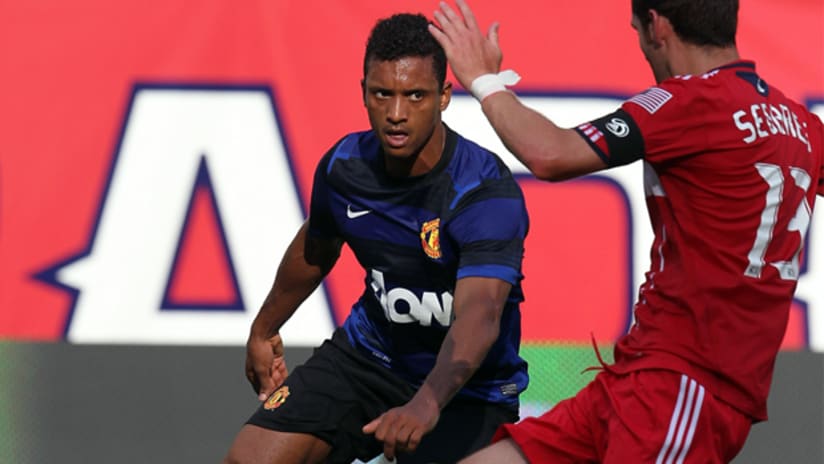 Manchester United's Nani tries to get around Chicago's Gonzalo Segares