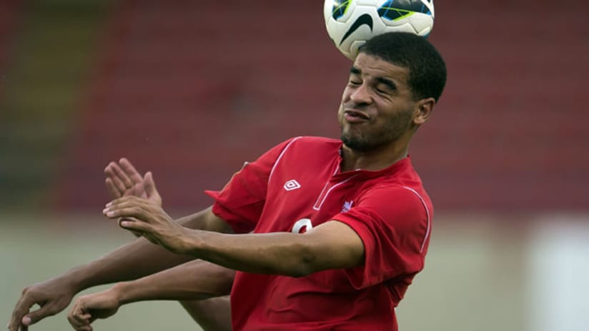 Canada U-17 striker Jordan Hamilton heads the ball