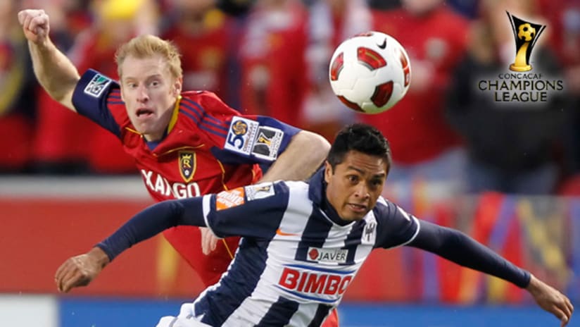 Real Salt Lake's Nat Borchers (left) battles Monterrey's Sergio Santana during the CONCACAF Champions League final on Wednesday.