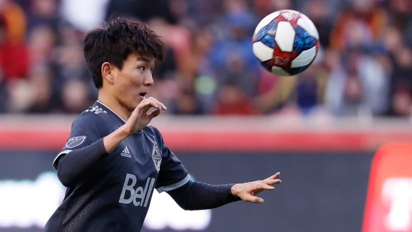 Inbeom Hwang heads the ball - Vancouver Whitecaps