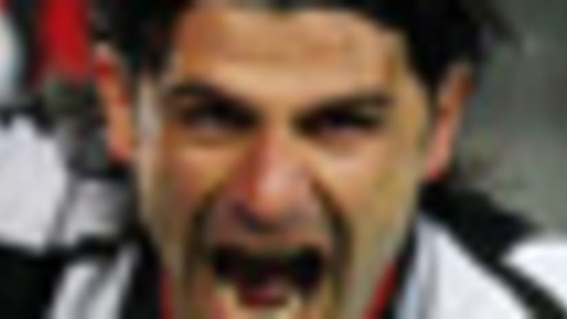 Juventus midfielder Hasan Salihamidzic (R) celebrates his winning goal in a victory over AC Milan.