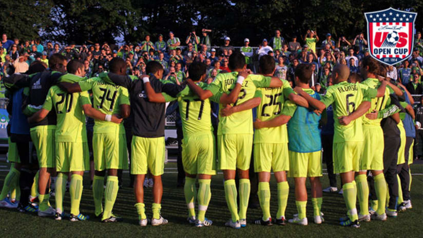 Seattle Sounders players huddle up before their USOC tilt vs. FC Dallas.