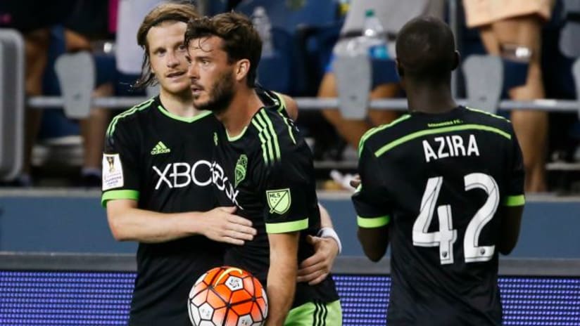Brad Evans with Seattle Sounders teammates Erik Friberg, Micheal Azira after scoring in 2015-16 Champions League