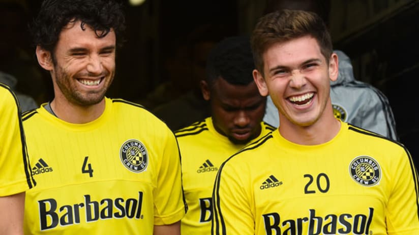 Wil Trapp laughs with Crew SC teammate Michael Parkhurst
