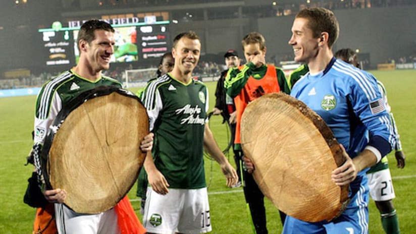 Kenny Cooper and Troy Perkins after Portland's win.