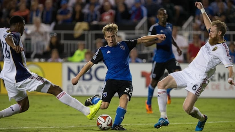 Tommy Thompson (San Jose Earthquakes) takes a shot as he is closed down by Real Salt Lake players