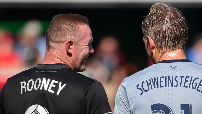 Wayne Rooney and Bastian Schweinsteiger - back of jerseys