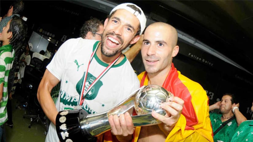 Herculez Gomez and Marc Crosas celebrate their Mexican title