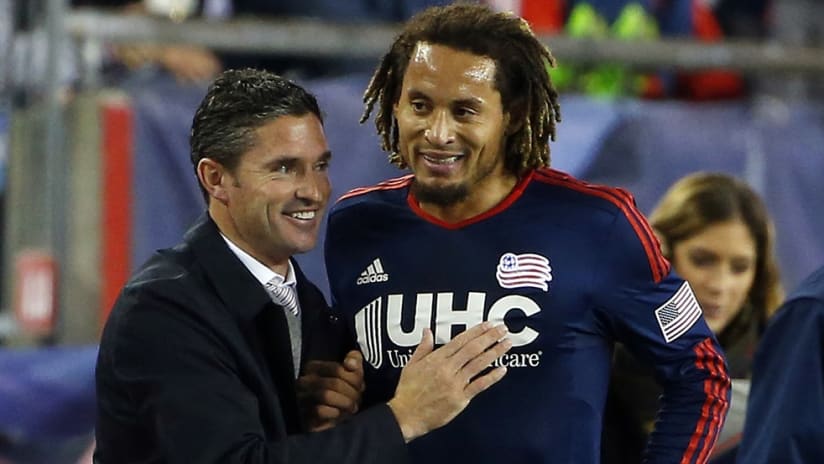 New England Revolution's Jermaine Jones shares a smile with Jay Heaps