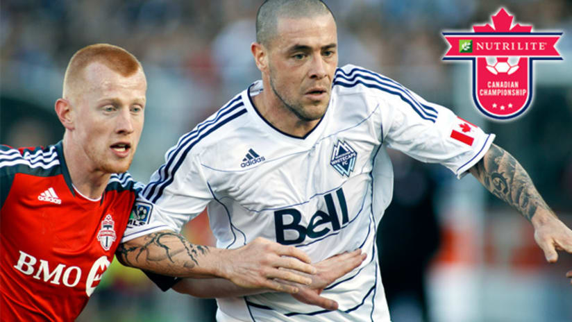 Whitecaps forward Eric Hassli (right) scored in the NCC matchup between Vancouver and Toronto.