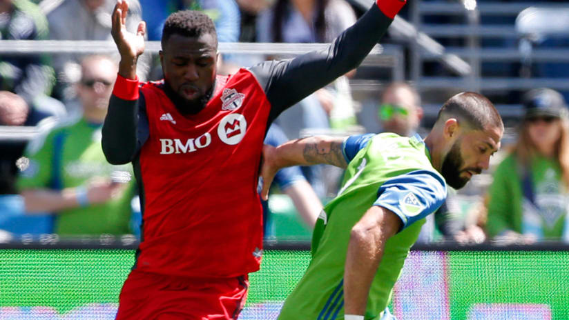 Jozy Altidore - Toronto FC - Clint Dempsey - Seattle Sounders - compete for the ball