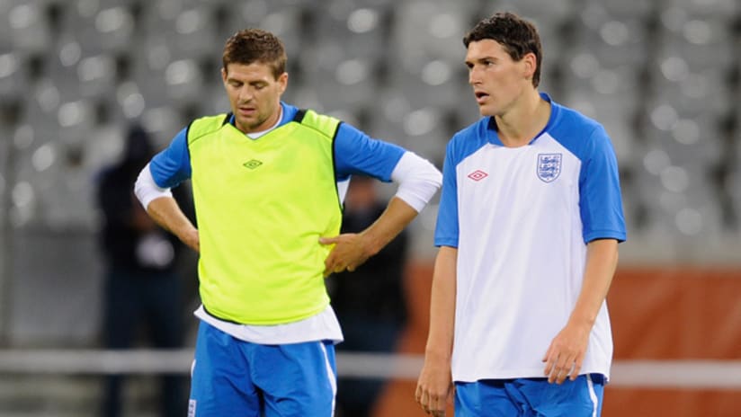 Steven Gerrard (left) should be freed up by the insertion of Gareth Barry.