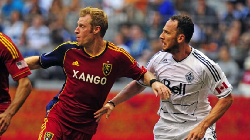 Nat Borchers of Real Salt Lake and Andy O'Brien of the Vancouver Whitecaps