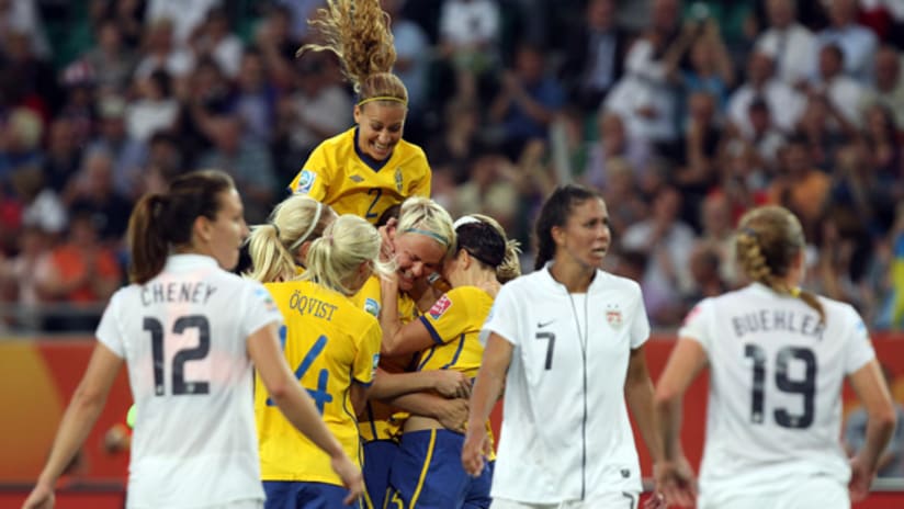 Members of the Swedish women's team react after scoring a goal against the US in the World Cup on Wednesday.