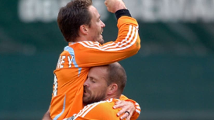 Craig Waibel and Richard Mulrooney celebrate their second-straight MLS Cup.