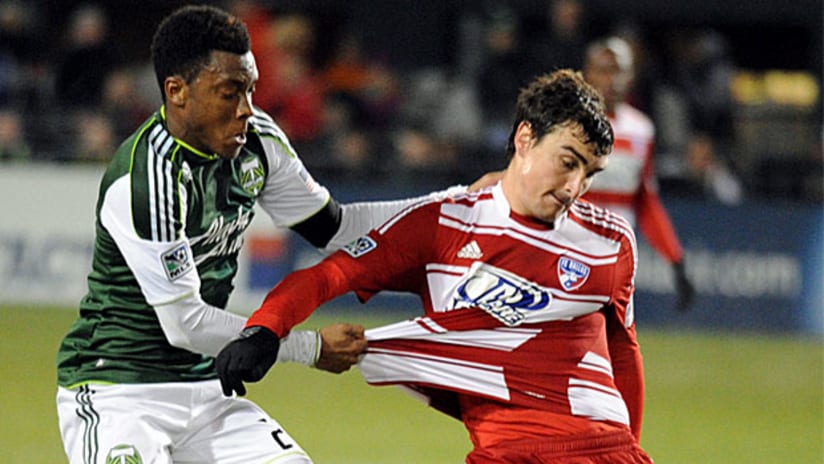 Rodney Wallace battles Bobby Warshaw during the Portland Timbers preseason tournament