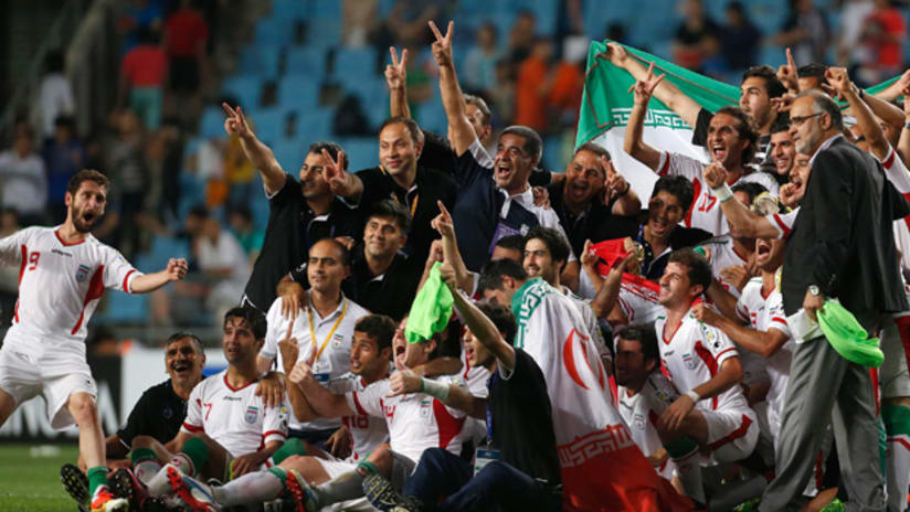 Iran national team celebrates clinching Brazil place
