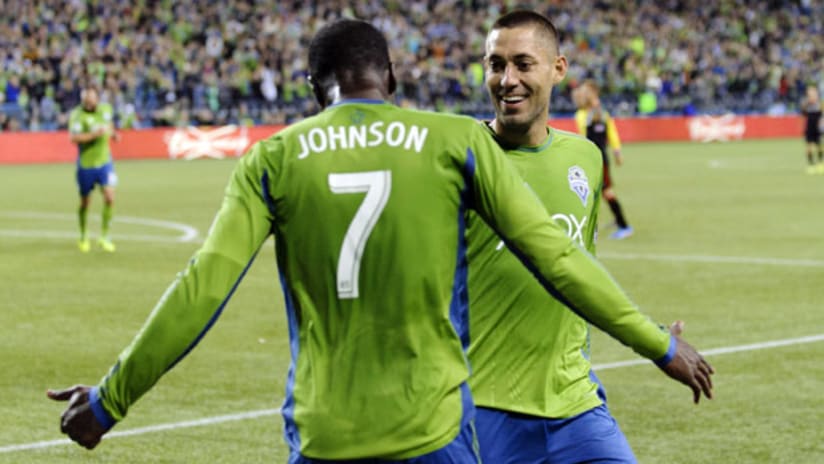 Seattle's Eddie Johnson and Clint Dempsey celebrates