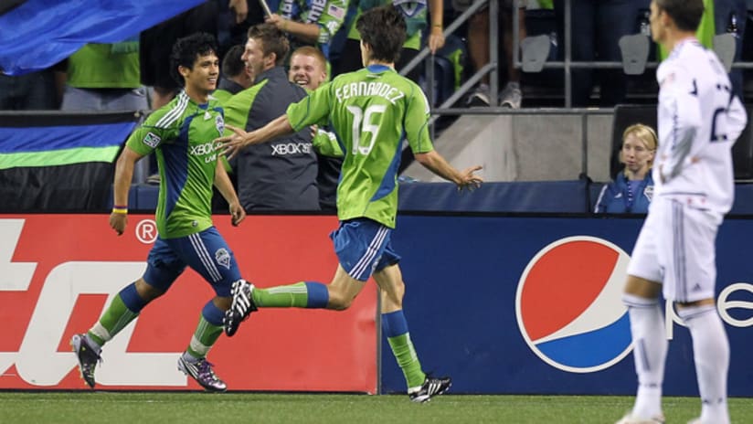 Fredy Montero (left) celebrates his game-winning goal, which gave Seattle a 2-1 win against Chicago.