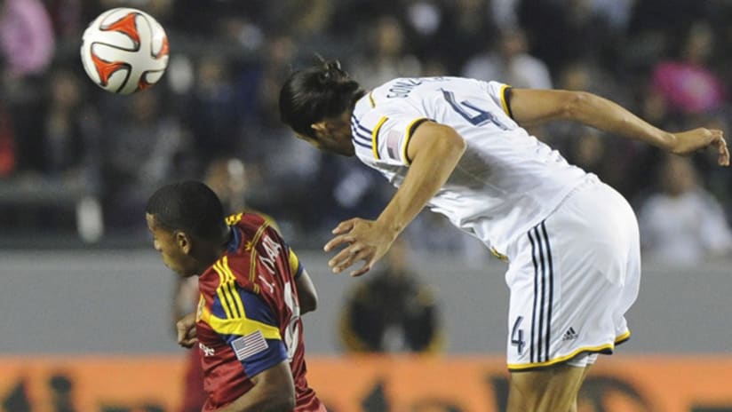 Omar Gonzalez of the LA Galaxy towers over Joao Plata of Real Salt Lake RSL to win a header