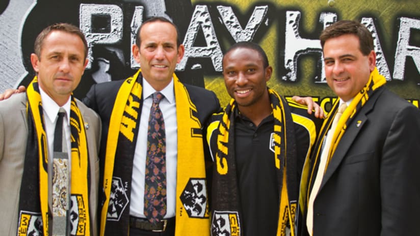 Crew coach Robert Warzycha, MLS Commissioner Don Garber, Crew forward Jeff Cunningham and Crew exec Mark McCullers