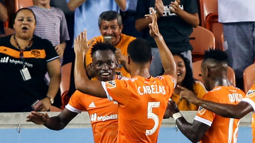 Alberth Elis - Houston Dynamo - gets surrounded by teammates after scoring