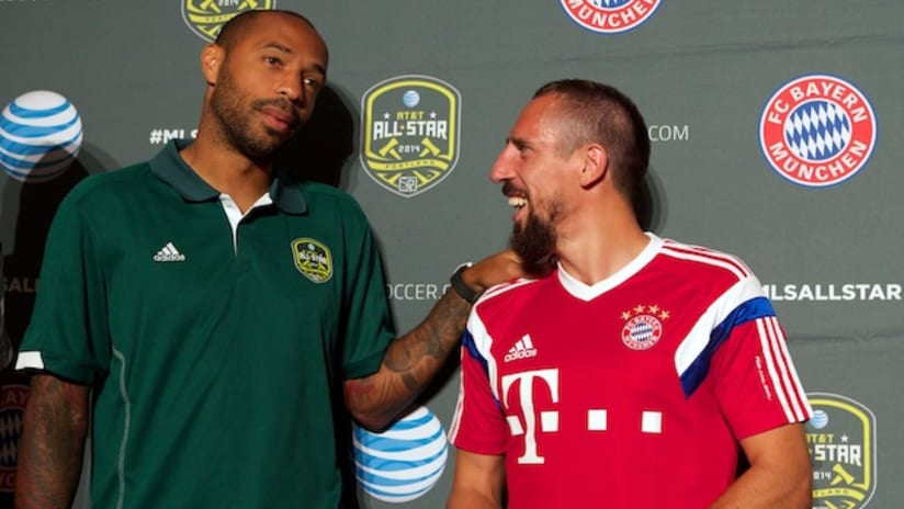 Thierry Henry and Franck Ribery share a moment during the All-Star press conference