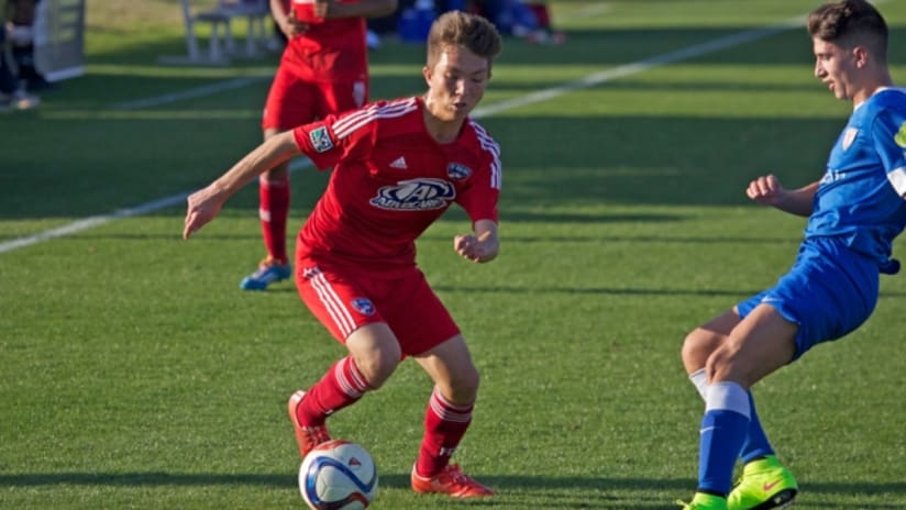 FC Dallas winger Toshiki Yasuda takes on a defender in Generation adidas Cup action