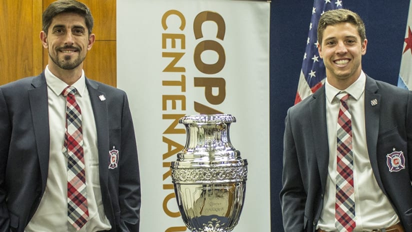 Matt Polster and Veljko Paunovic with the Copa America trophy
