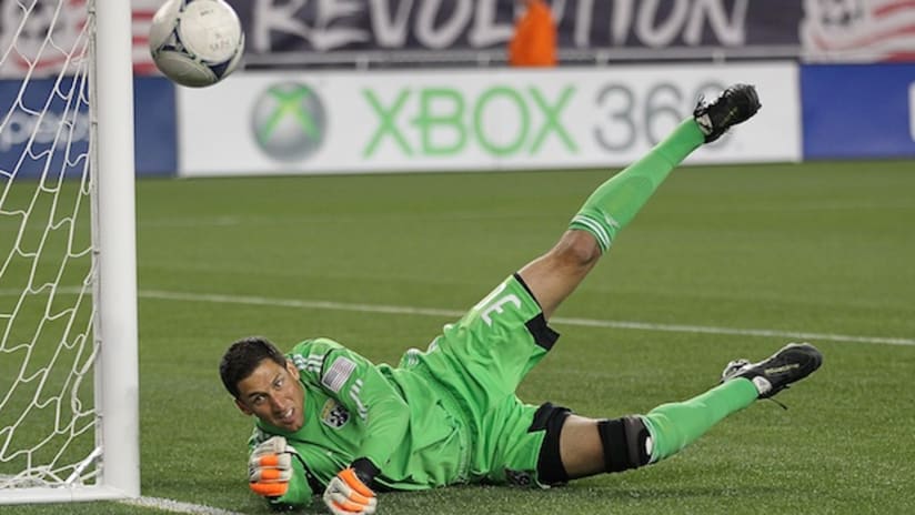 Andy Gruenebaum makes a save on Lee Nguyen