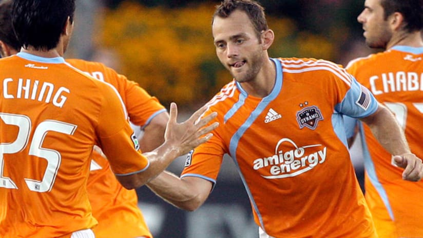Brad Davis will likely miss Houston's important match at New England.