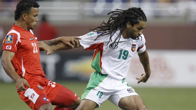 Stephane Auvray of Guadeloupe tries to control the ball next to Eybir Bonaga of Panama during the 2011 Gold Cup at Ford Field on June 7, 2011.