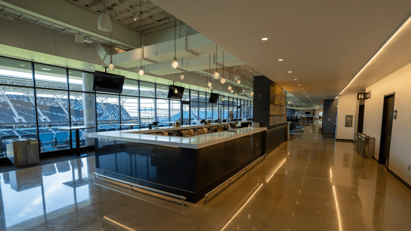View of the bar and windows inside the Stadium Club