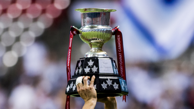 Voyageurs Cup being raised at BC Place